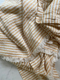 yellow and white striped linen throw blanket or tablecloth