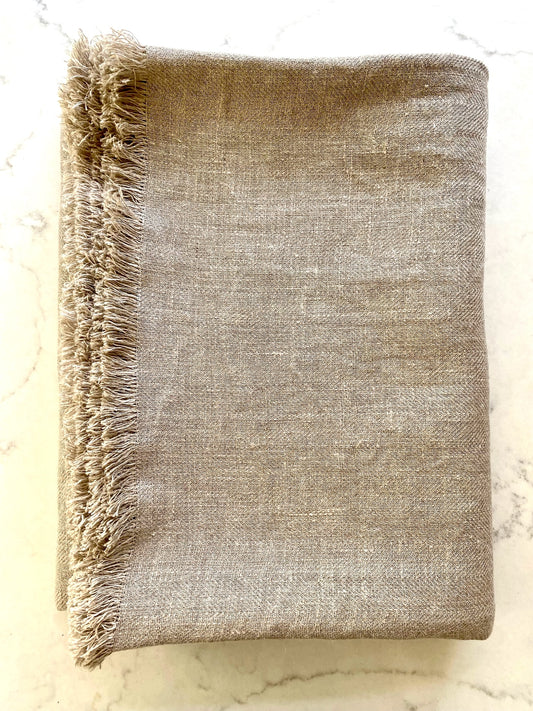 Linen throw blanket or tablecloth made from undyed natural linen